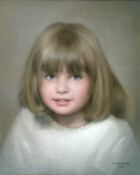 A little girl in a white jumper