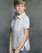 A young boy with a golf club