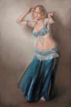 Bellydancer in blue with arms raised