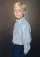 A young boy standing